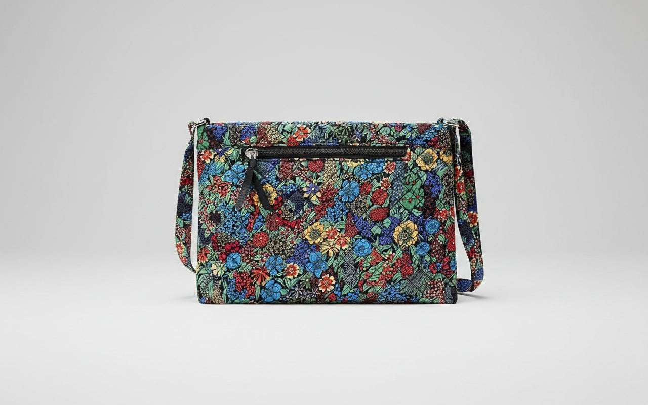 Floral patterned handbag with a crossbody strap