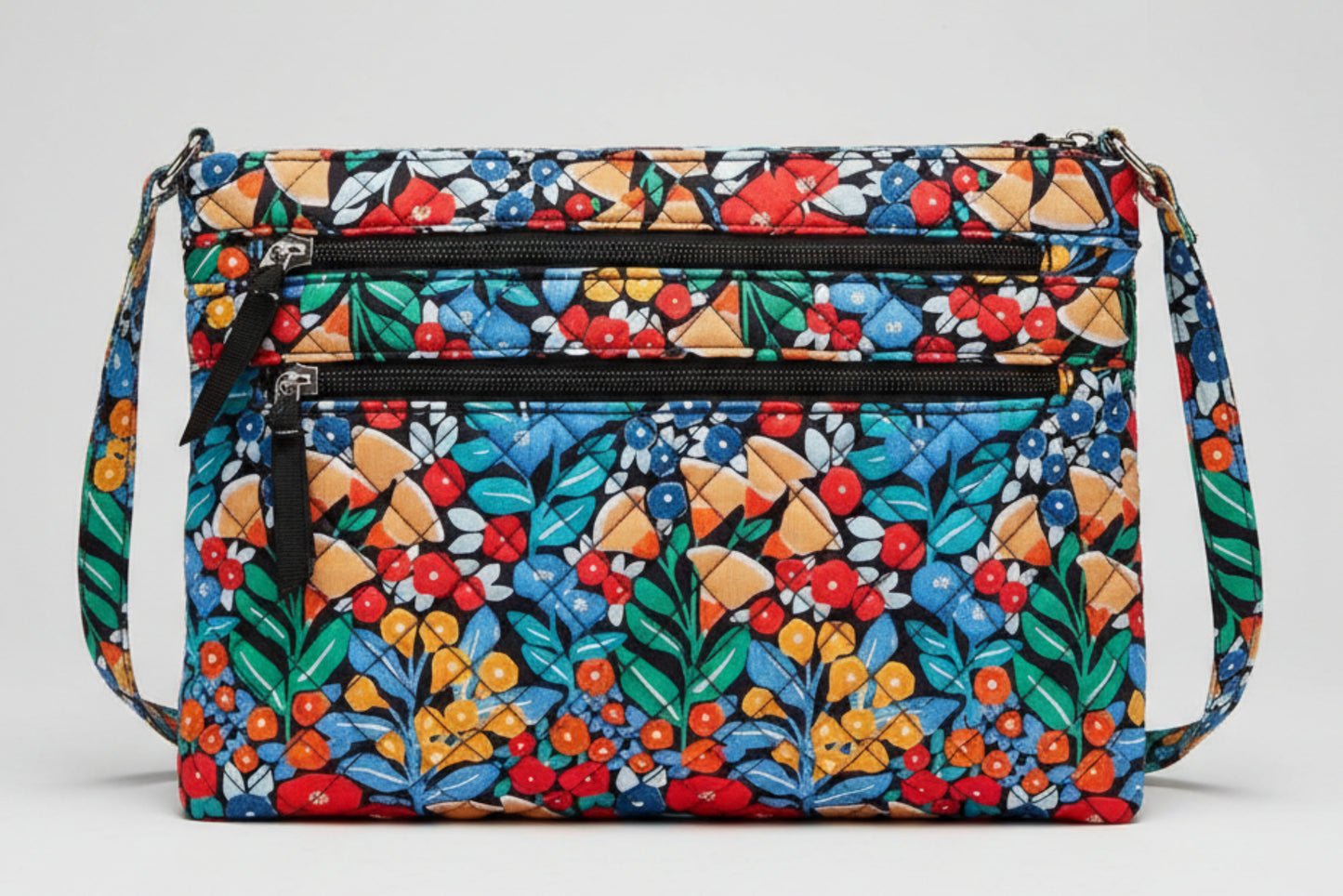 Floral patterned handbag with a crossbody strap