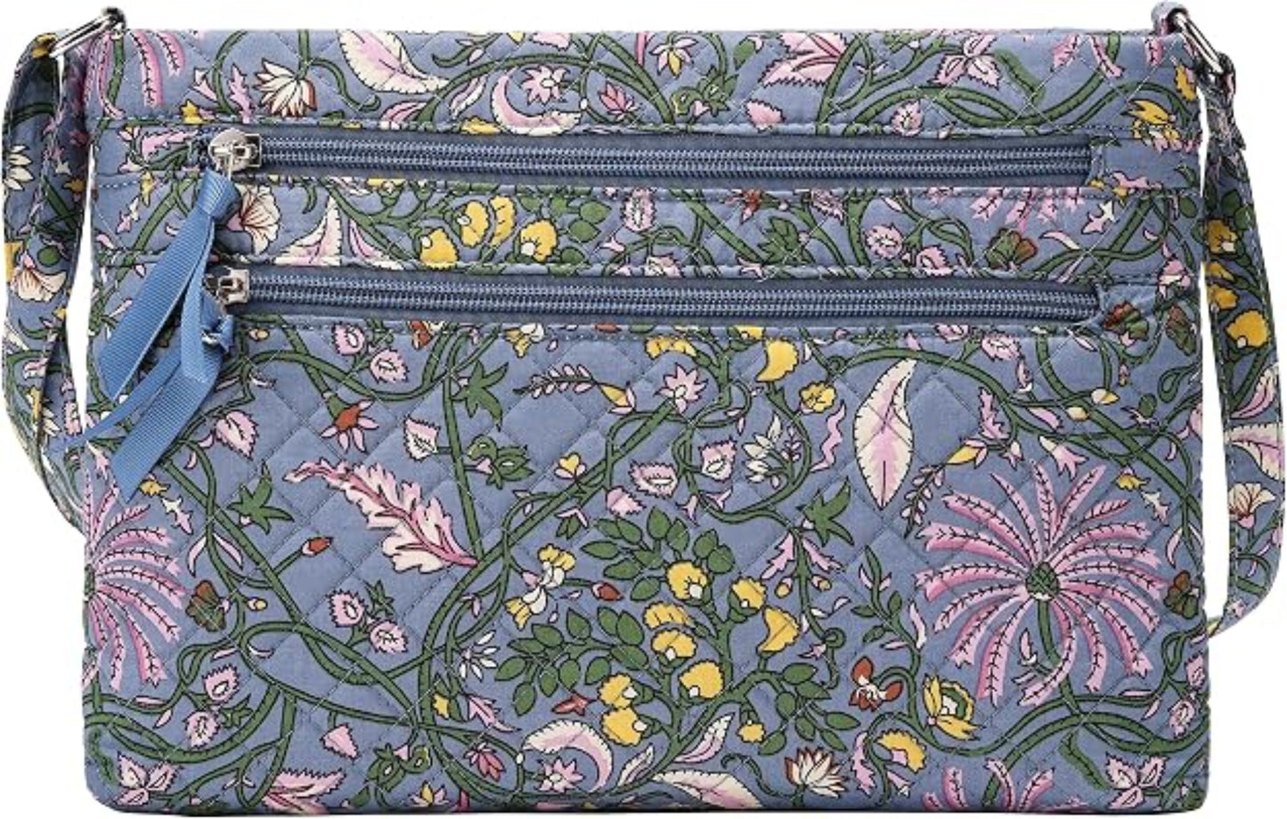 Floral patterned handbag with a crossbody strap