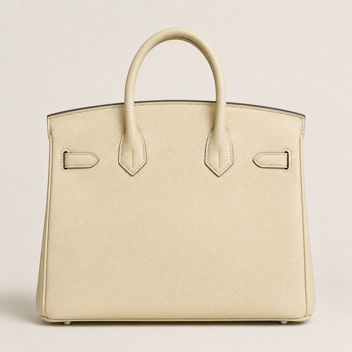 Ivory genuine leather handbag side view with rolled top handles