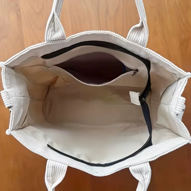 White tote bag with black zipper